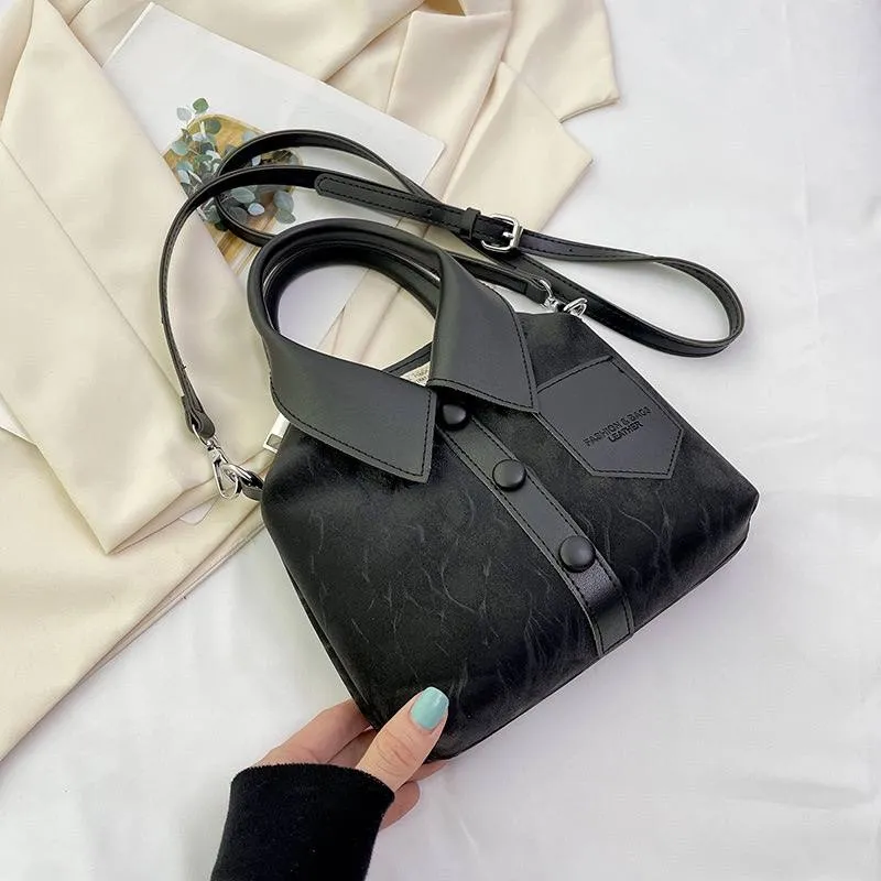 کیف دستی زنانه طرح پیراهن مشکی 1